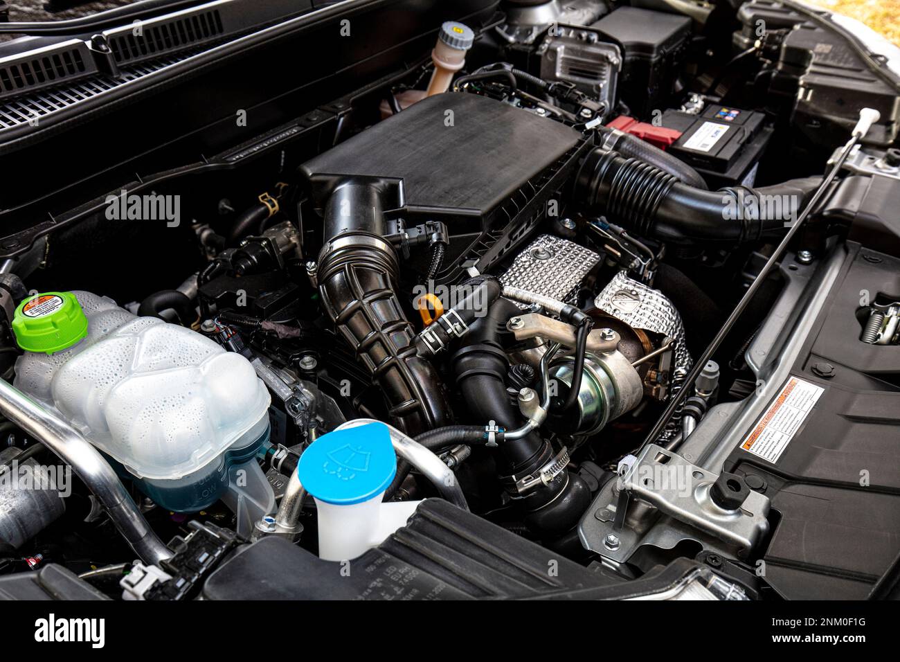 medium hybrid car engine background Stock Photo