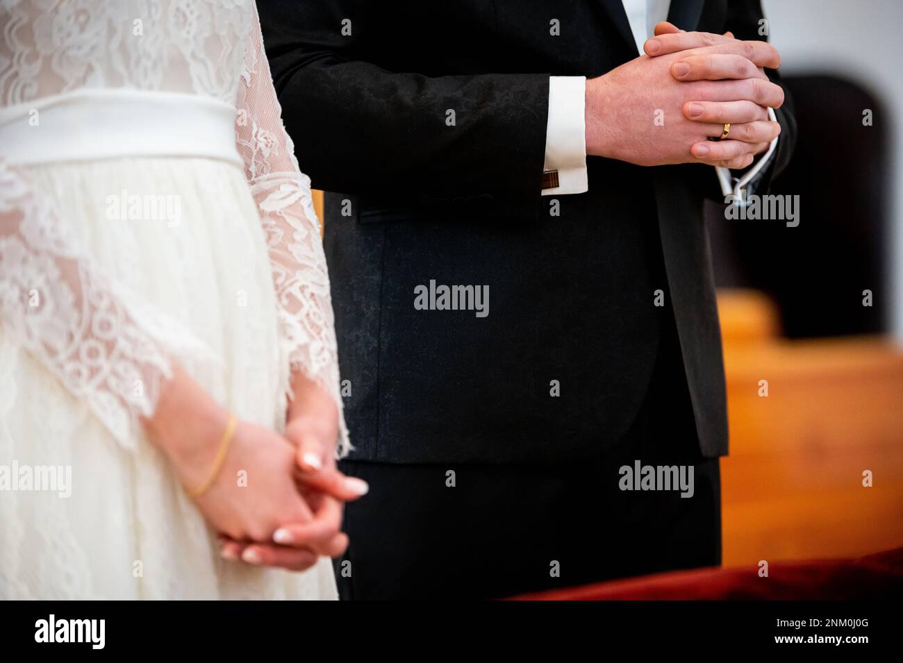 hands, wedding rings and marriage vows hands of the bride and groom