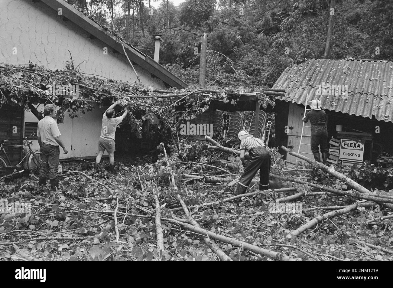 After a storm in Limburg; branches are removed from home ca. 1985 Stock Photo