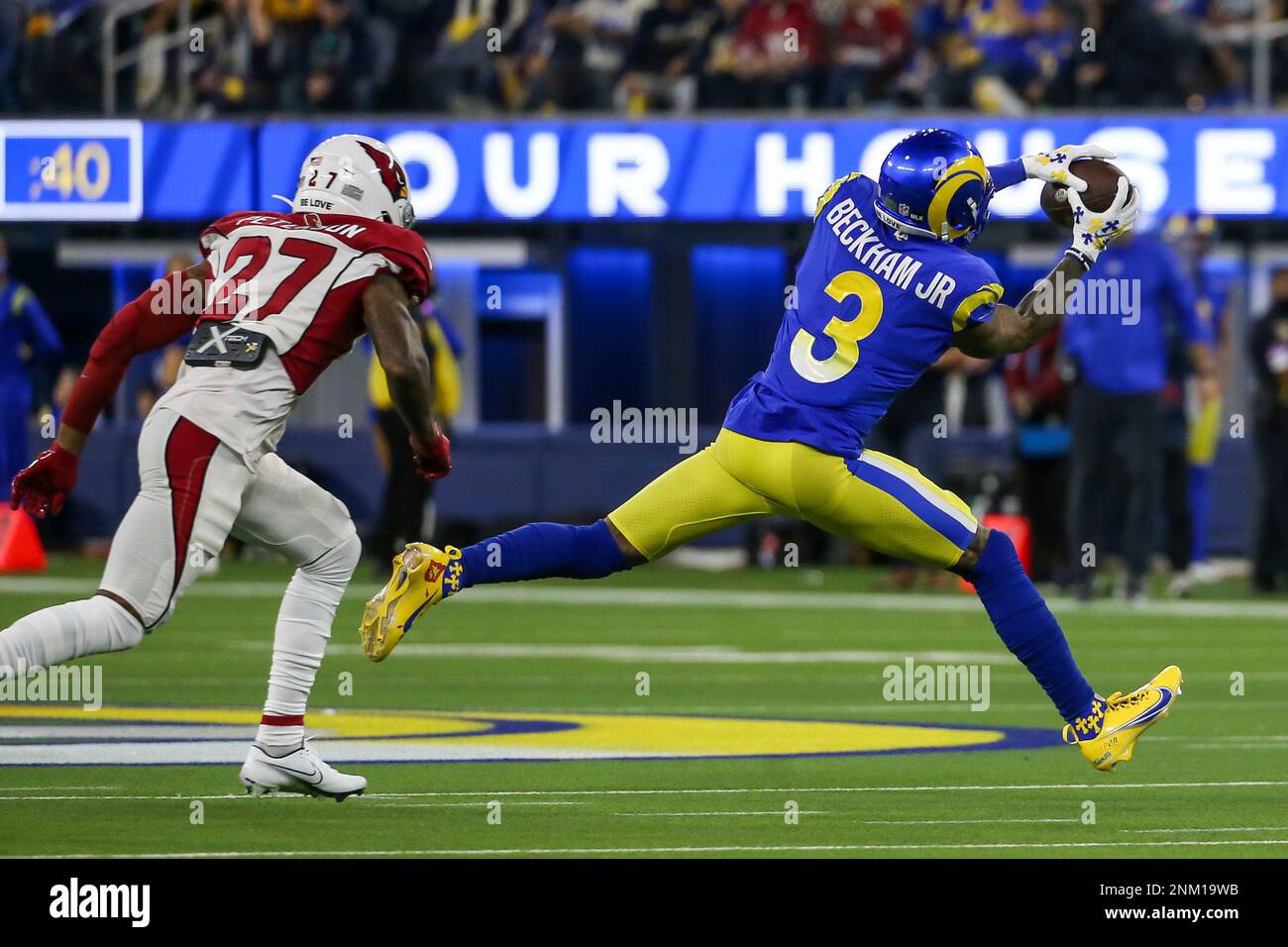 INGLEWOOD, CA - JANUARY 17: Los Angeles Rams quarterback Matthew Stafford  #9 breaks the pocket during the NFC Wild Card playoff game between the  Arizona Cardinals and the Los Angeles Rams on