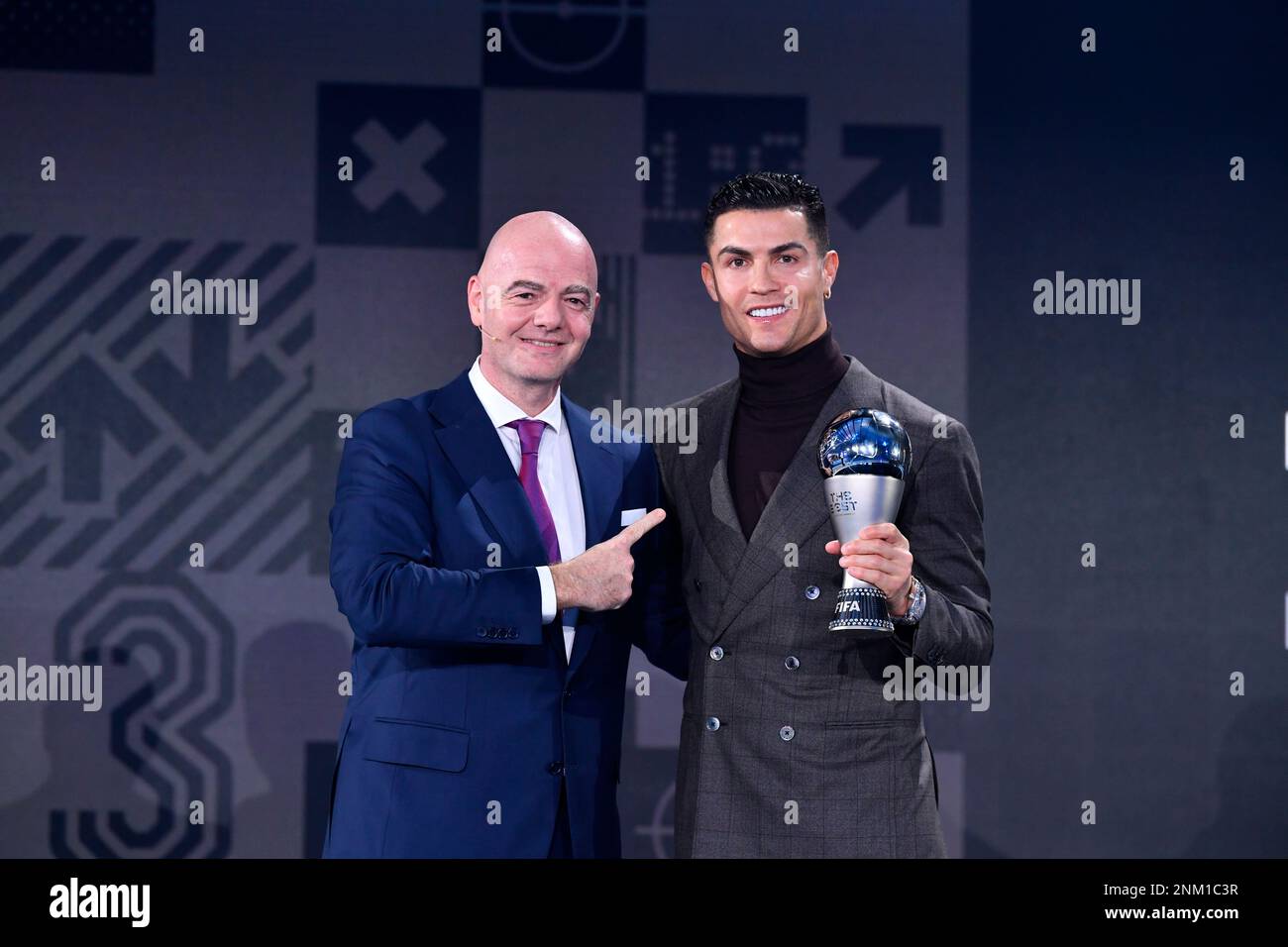 FIFA President Gianni Infantino, left, presents the FIFA Special Best