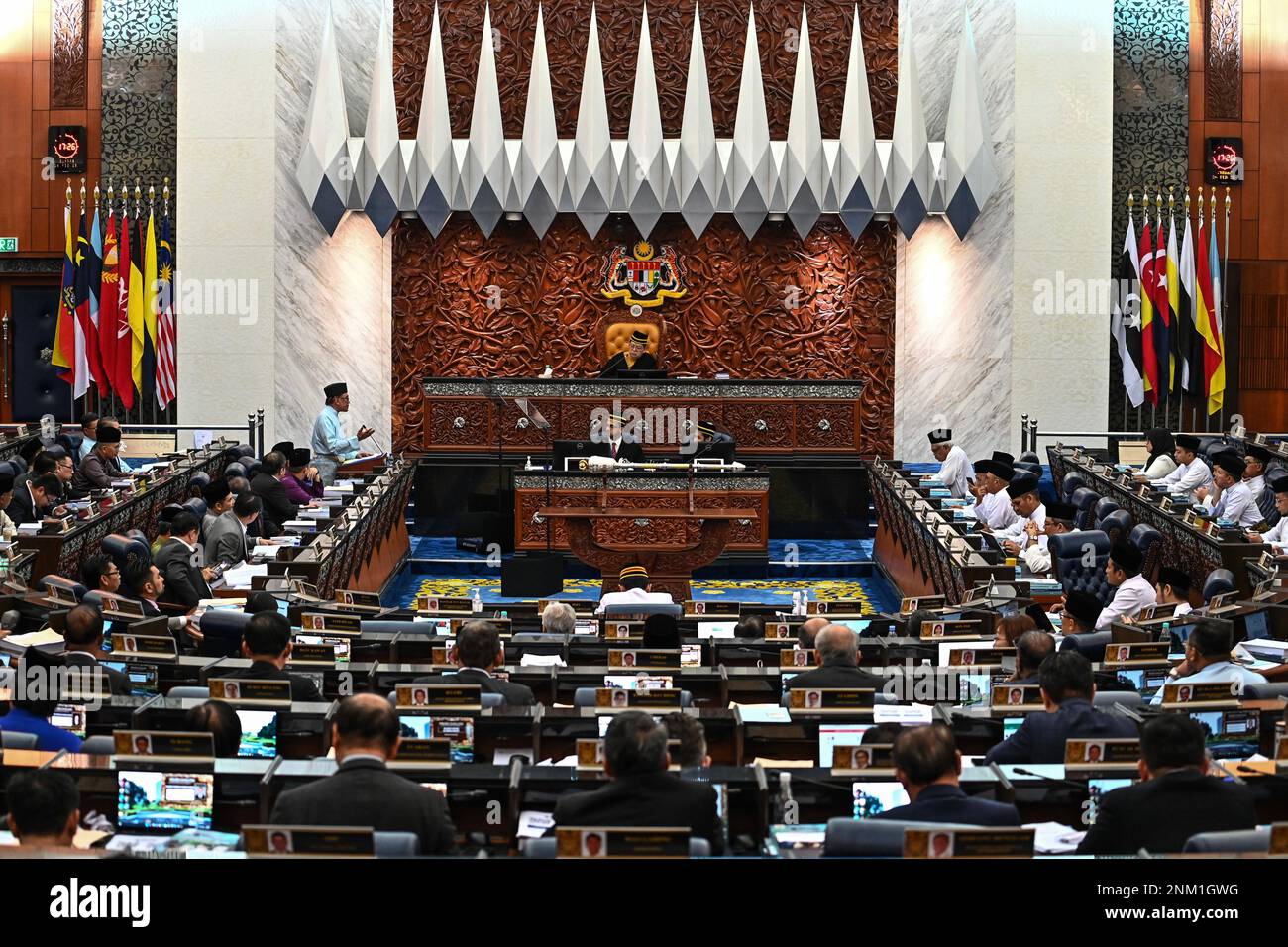 (230224) -- KUALA LUMPUR, Feb. 24, 2023 (Xinhua) -- Malaysian Prime Minister Anwar Ibrahim proposes the national budget at the parliament house in Kuala Lumpur, Malaysia, Feb. 24, 2023. The Malaysian government led by Prime Minister Anwar Ibrahim on Friday proposed a 388.1 billion ringgit (87.5 billion U.S. dollars) national budget aimed at helping the country resolve a number of domestic issues. Anwar, who is also the finance minister, said the budget will focus on addressing the high cost of living, further strengthening the social safety net and enhancing the micro, small and medium enter Stock Photo