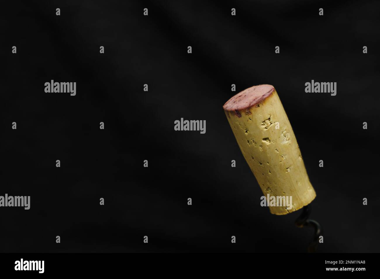 Cork of red wine against dark background with copy space Stock Photo Alamy