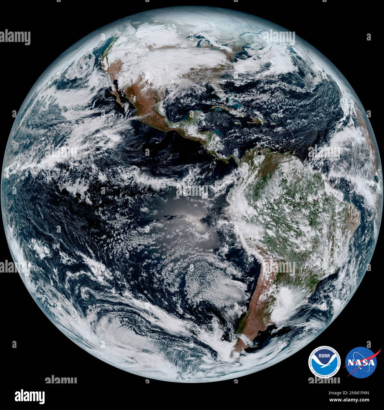 This composite color full-disk visible image of the Western Hemisphere was captured from NOAA GOES-16 satellite at 1:07 pm EST on Jan. 15, 2017 and created using several of the 16 spectral channels available on the satellite's sophisticated Advanced Baseline Imager. The image shows North and South America and the surrounding oceans ca. 15 January 2017 Stock Photo