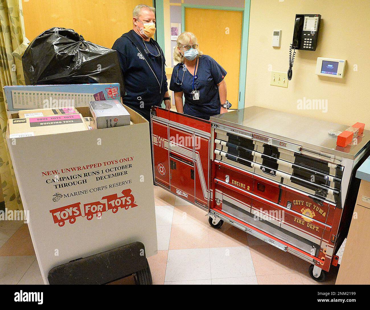Yuma Fire Department Capt. Paul Evancho (left) and Yuma Regional