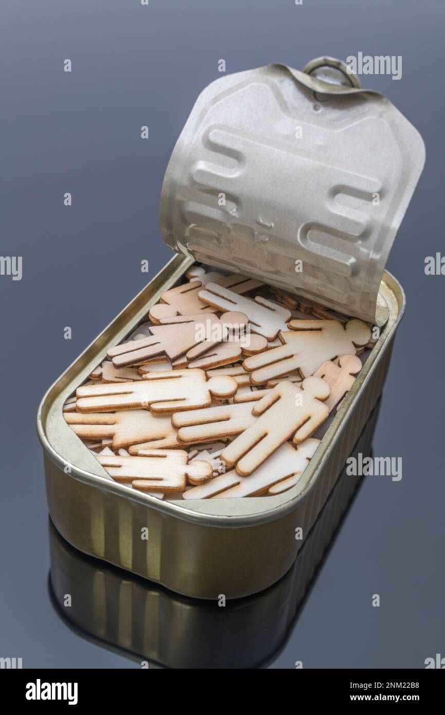 Lasercut wooden male and female shaped packed into a metal sardine can