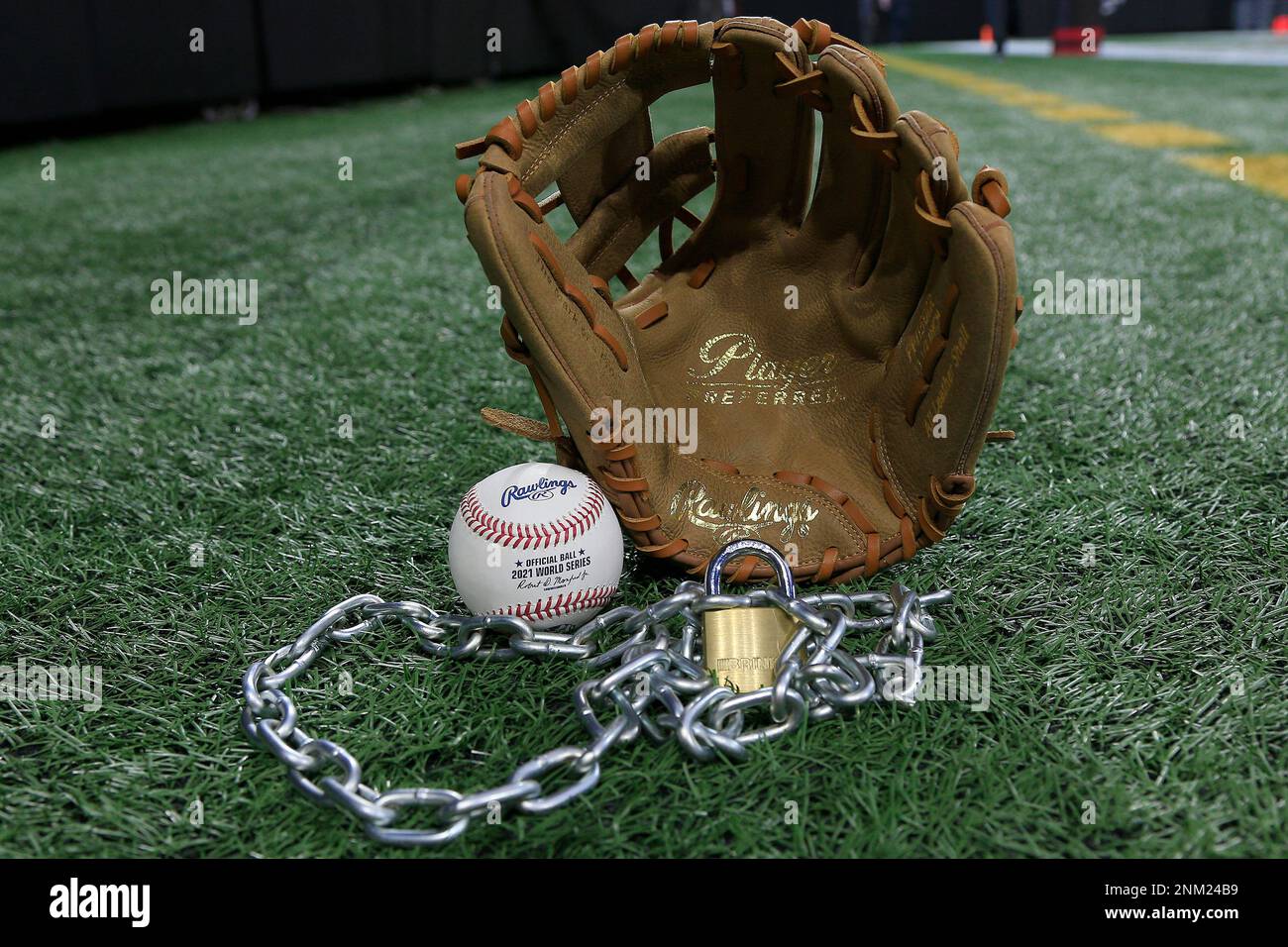 Atlanta, GA - January 09: An Official Rawlings Major League baseball sits  with a glove, lock and chain to represent the lockout between Major League  Baseball (MLB) and the Major League Baseball