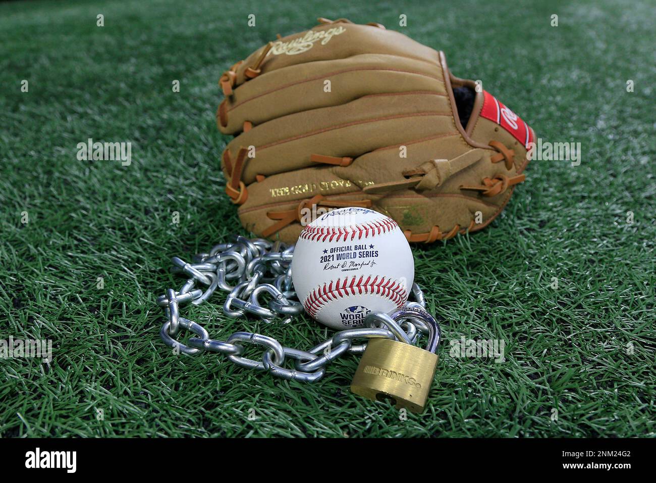 Atlanta, GA - January 09: An Official Rawlings Major League baseball sits  with a glove, lock and chain to represent the lockout between Major League  Baseball (MLB) and the Major League Baseball