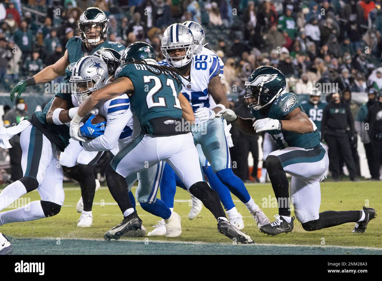 Dallas Cowboys running back Ito Smith (43) scores a touchdown on a four  yard run as Philadelphia Eagles defensive back Andre Chachere (21) and  safety Jared Mayden (41) attempt a tackle during