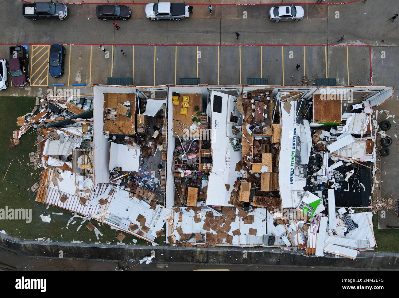 Damage to a business complex by a possible tornado near South Houston