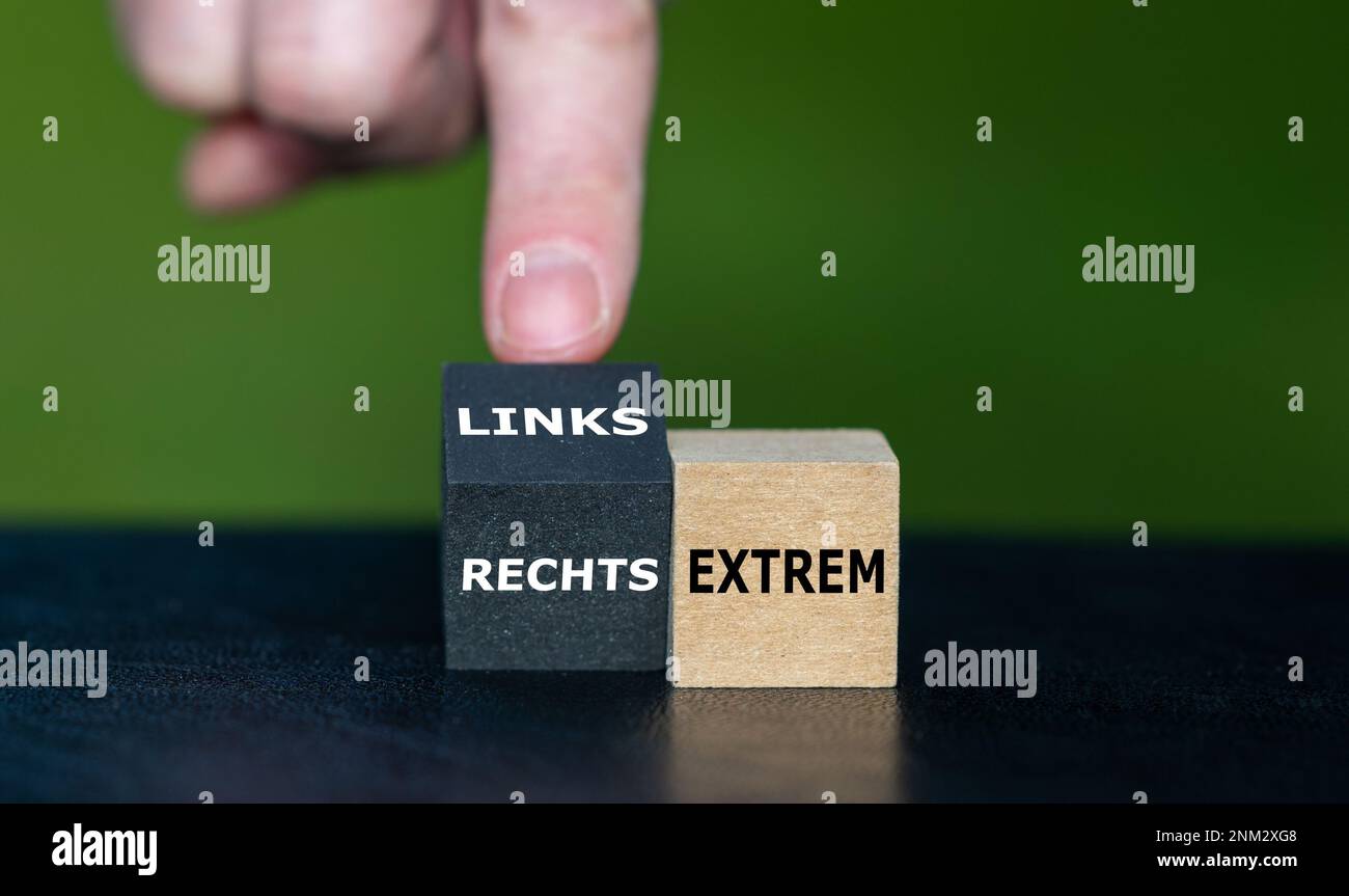 Wooden cubes form the German expression 'linksextrem' (extreme left) and 'rechtsextrem' (extreme right). Stock Photo