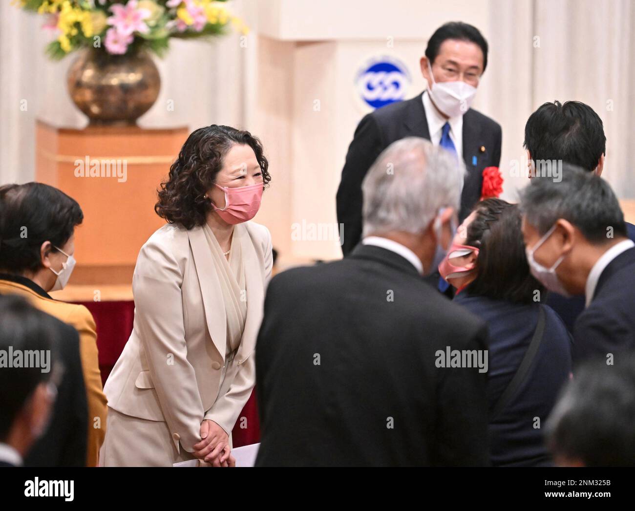 Japanese Prime Minister Fumio Kishida (R) greets with Tomoko Yoshino,  President of the Japanese Trade Union Confederation (RENGO) during the New  Year celebration in Arakawa Ward, Tokyo on Jan. 5, 2022. (