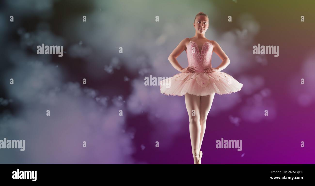 Composition of female ballet dancer in pink tutu with copy space on cloud over purple background. ballet, dance and fitness concept digitally generate Stock Photo