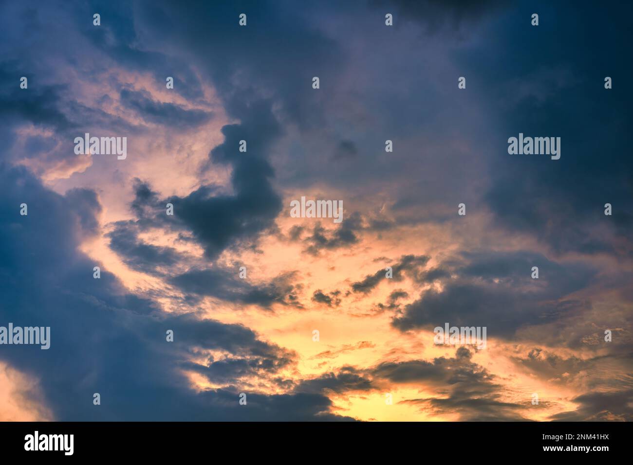 Beautiful dramatic colorful sunset sky with clouds Stock Photo