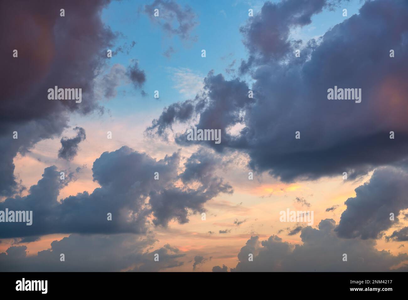 Beautiful dramatic colorful sunset sky with clouds Stock Photo