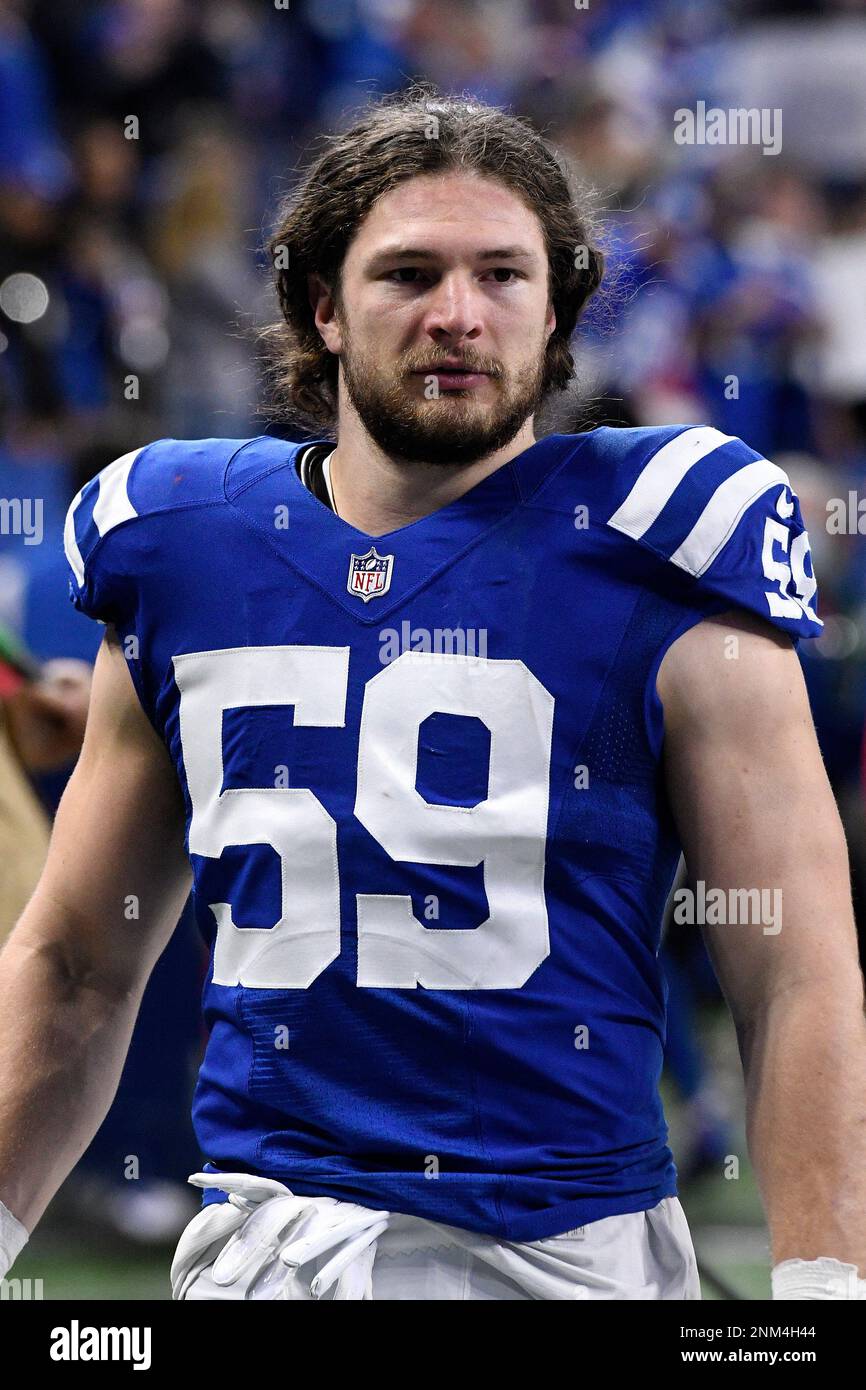 INDIANAPOLIS, IN - DECEMBER 18: Indianapolis Colts Linebacker Jordan  Glasgow (59) walks off the field at the conclusion of the NFL football game  between the New England Patriots and the Indianapolis Colts