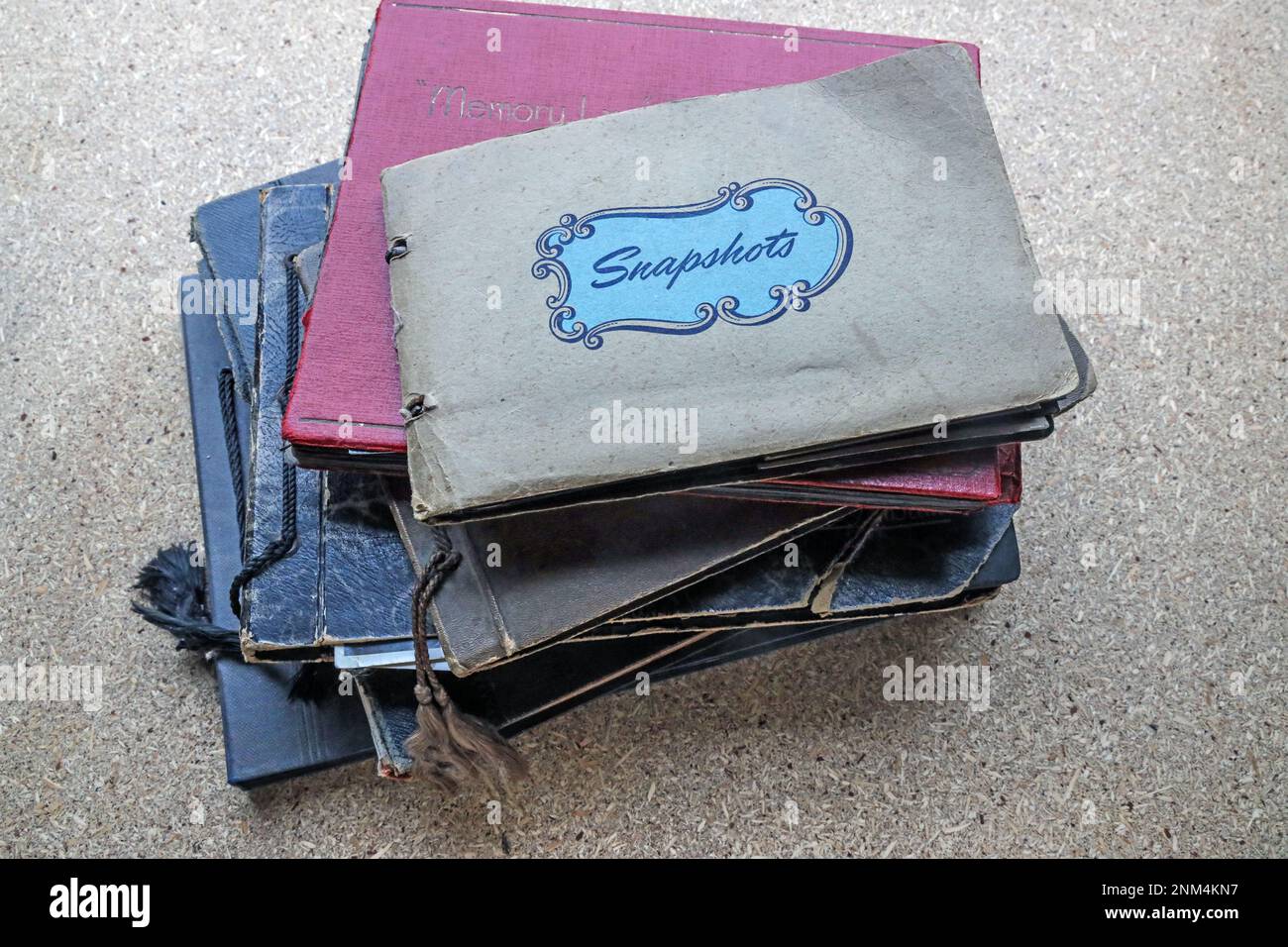 Are photo albums a thing of the past. A pile of vintage photograph
