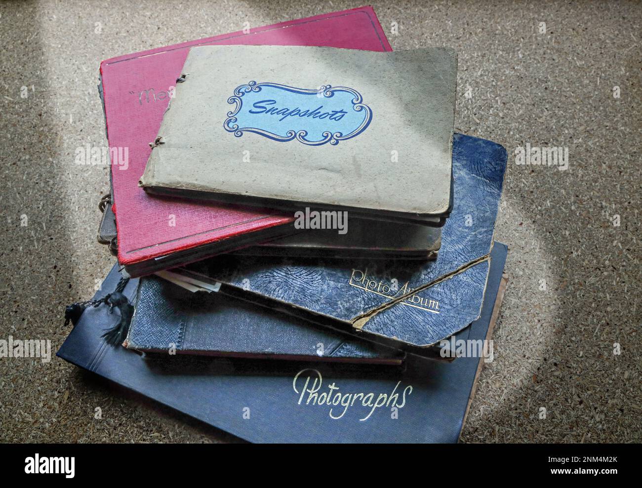 Are photo albums a thing of the past. A pile of vintage photograph