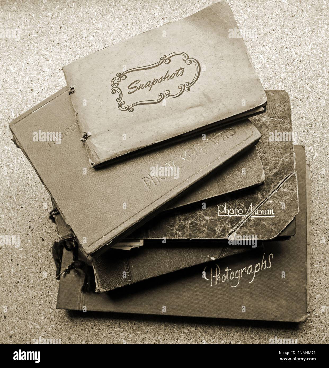 Are photo albums a thing of the past. A pile of vintage photograph