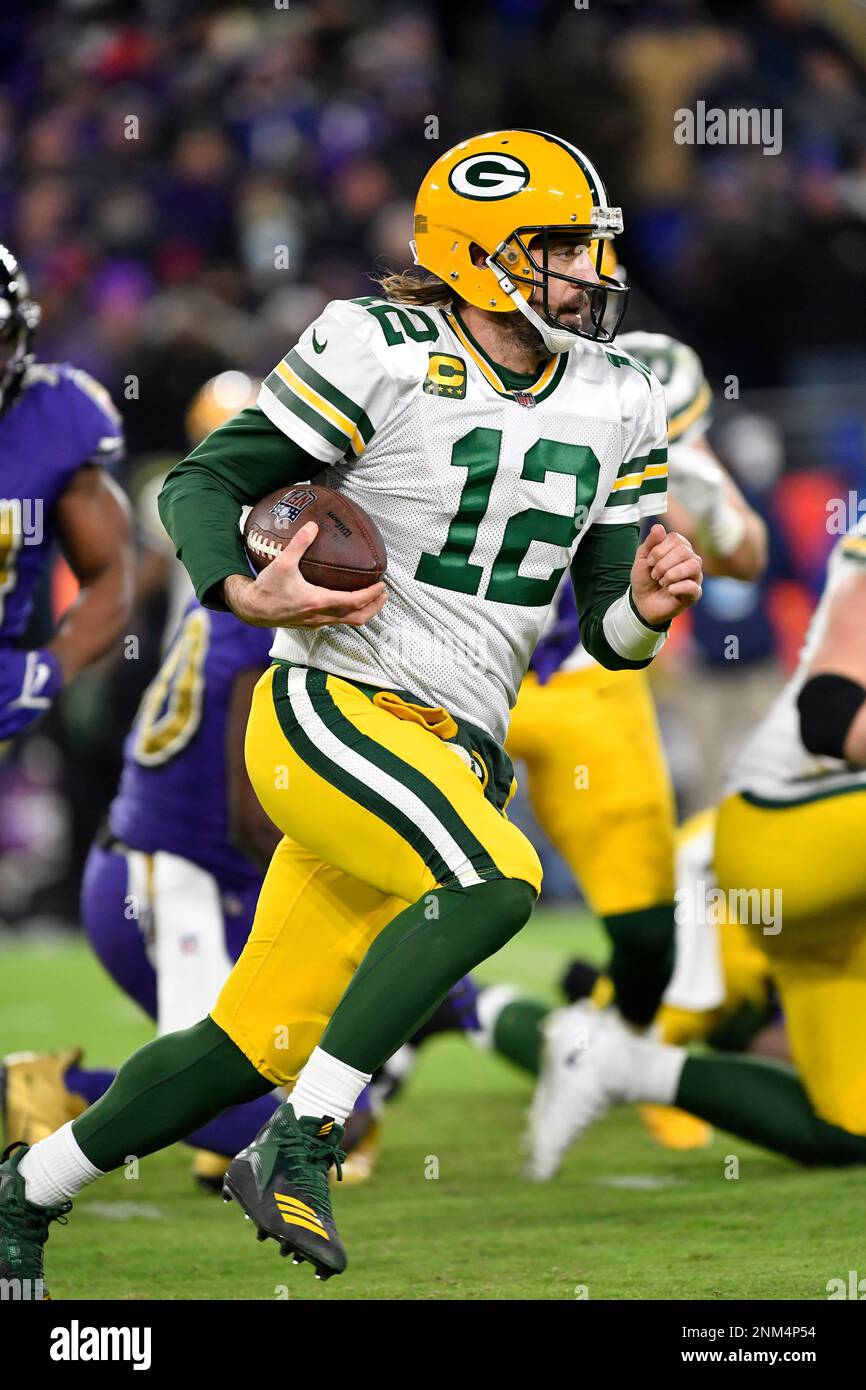 BALTIMORE, MD - DECEMBER 19: Packers running back A.J. Dillon (28) runs the  ball during the Green Bay Packers versus Baltimore Ravens NFL game at M&T  Bank Stadium on December 19, 2021