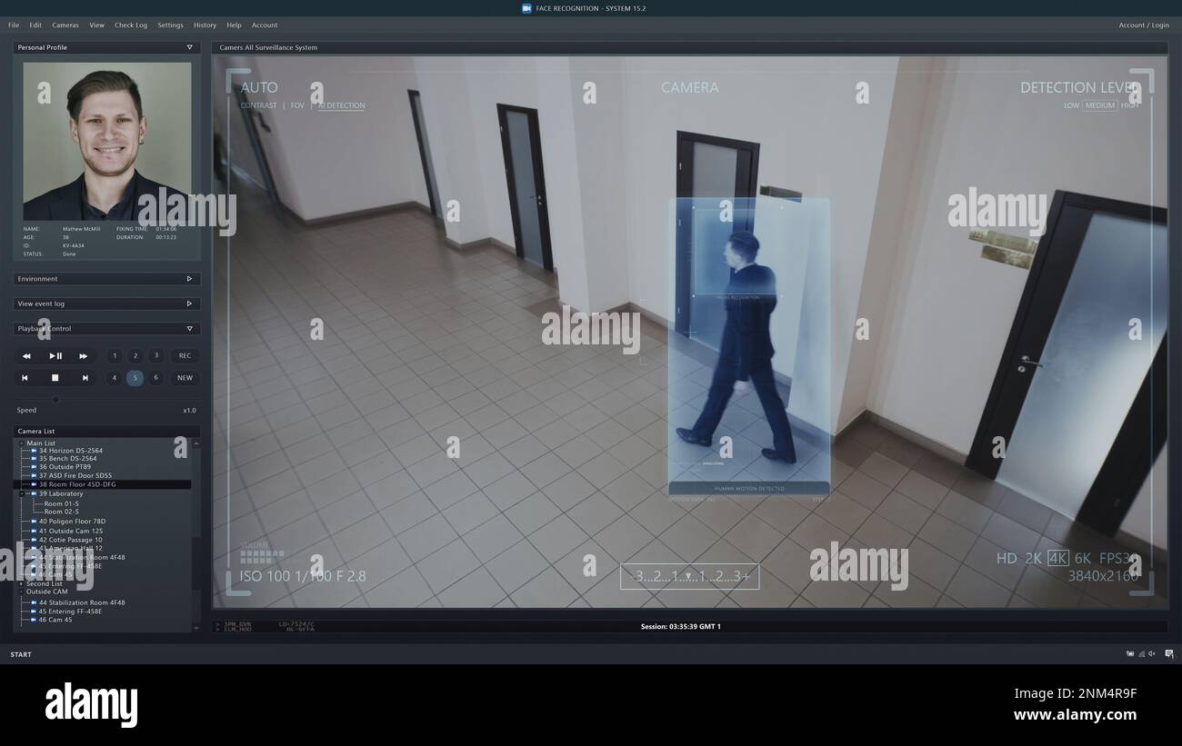 Playback office CCTV camera on computer. Interface of AI software with digital facial recognition and personal profile with information about people. Security camera with face scanning analyze system. Stock Photo