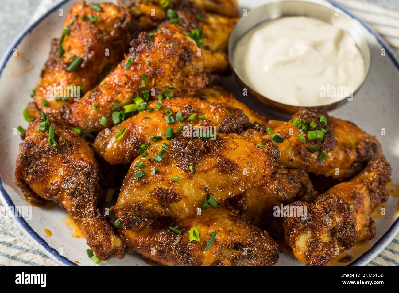 Homemade Nashville Hot Chicken Wings with Ranch Dressing Stock Photo