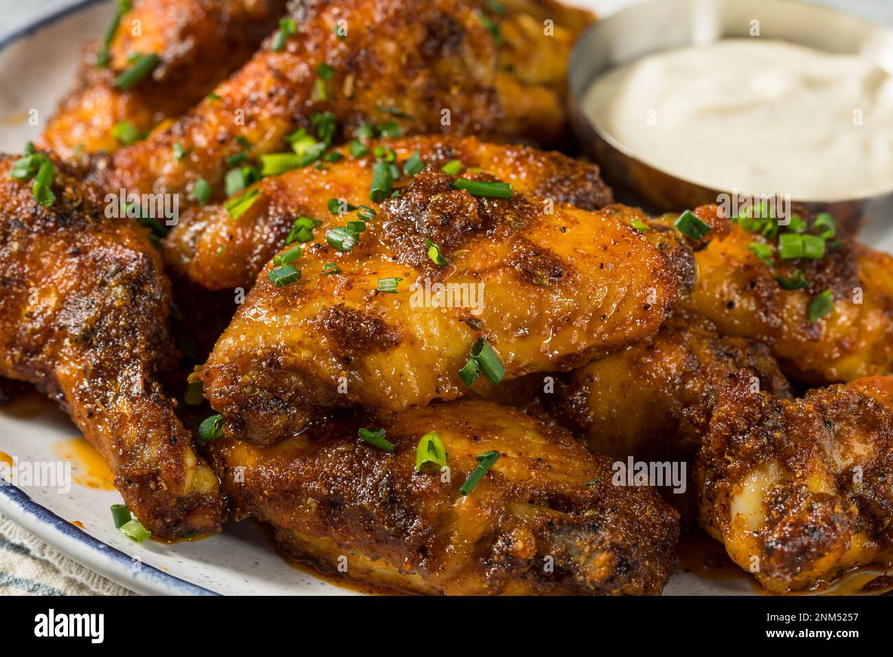 Homemade Nashville Hot Chicken Wings with Ranch Dressing Stock Photo