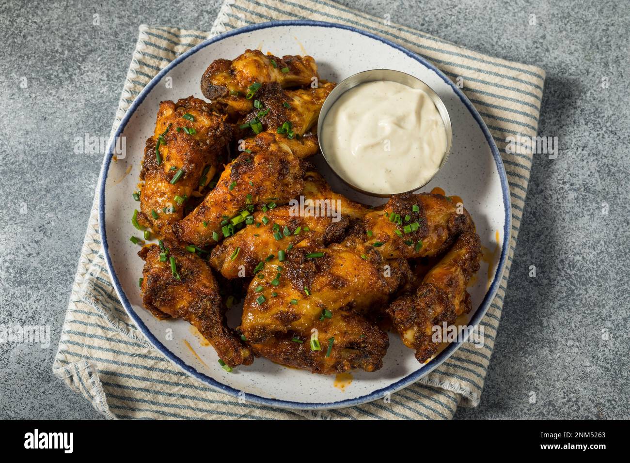 Homemade Nashville Hot Chicken Wings with Ranch Dressing Stock Photo