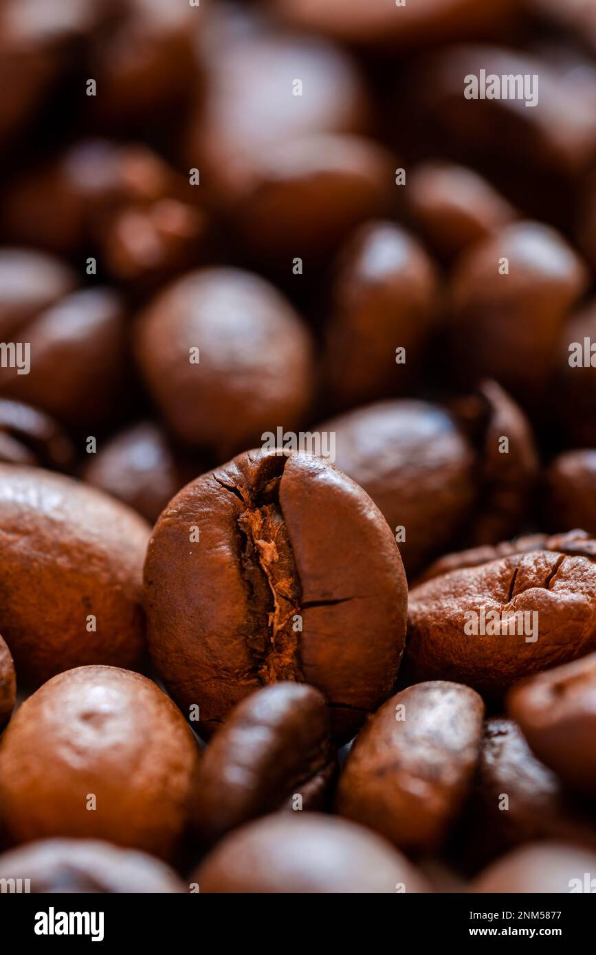 closeup of a pile of lying coffee beans Stock Photo