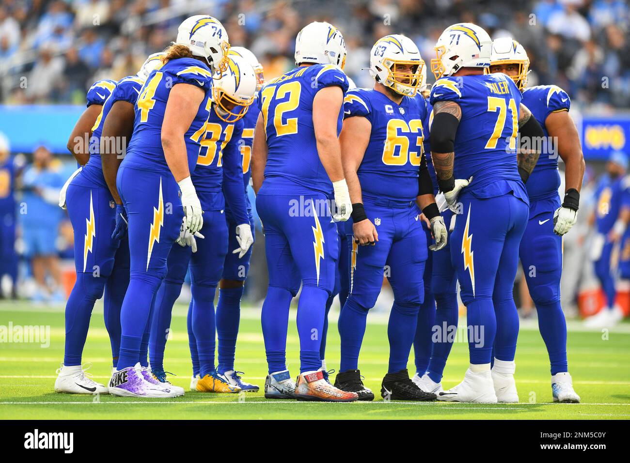 INGLEWOOD, CA - DECEMBER 12: Los Angeles Chargers huddle during the NFL  game between the New York Giants and the Los Angeles Chargers on December  12, 2021, at SoFi Stadium in Inglewood