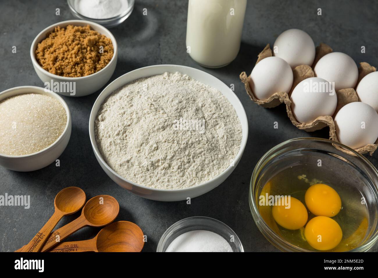 Organic Raw Baking Ingredients with Flour Sugar Milk and Eggs Stock
