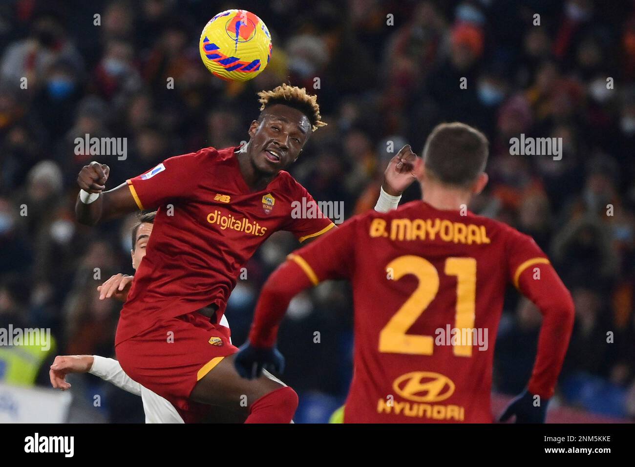 Sevilla's Loic Bade, top, heads the ball past Roma's Tammy Abraham