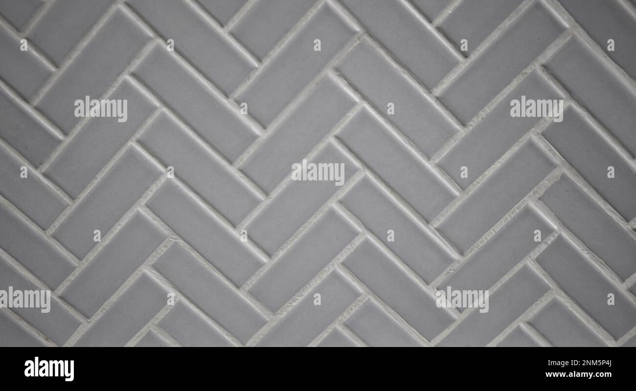 Gray Grey porcelain ceramic herringbone tile for a backsplash, kitchen