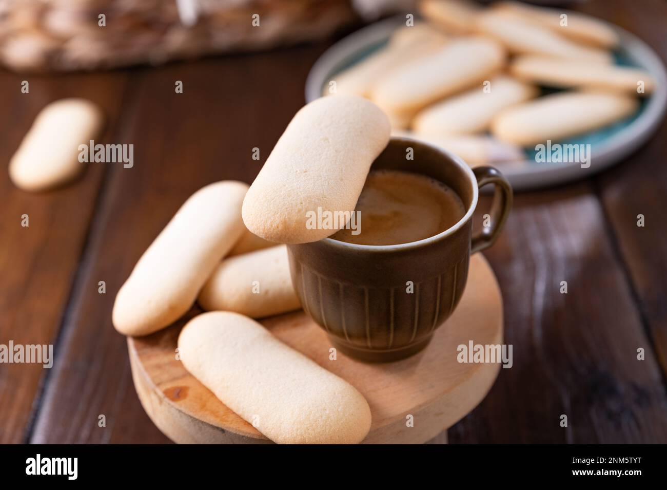 Cookies cat's tongue. Traditional Indonesian and Italian biscuit