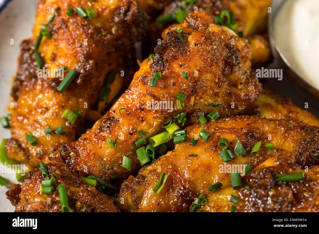Homemade Nashville Hot Chicken Wings with Ranch Dressing Stock Photo