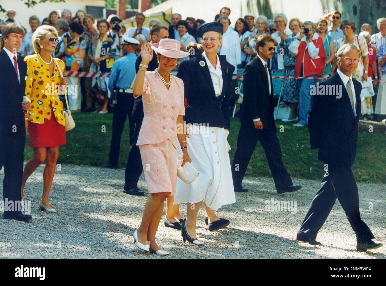 VADSTENA 1993-07-15 QUEEN SILVIA AND MARGRETHE II a step behind of Swedish King Carl XVI Gustav during a visit to old religious town Vadstena Stock Photo