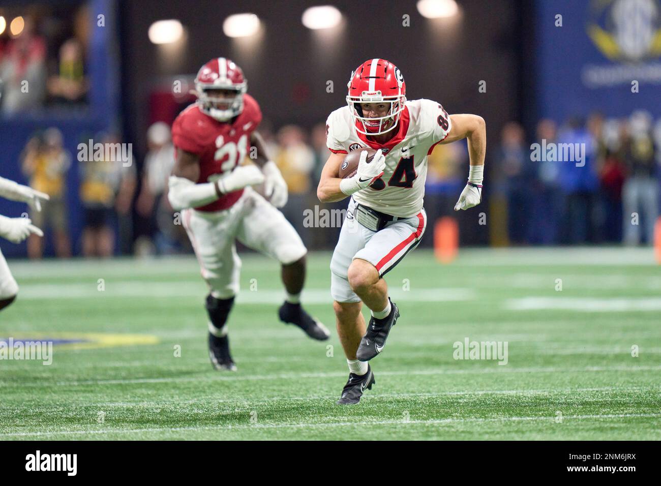 Georgia wide receiver Ladd McConkey (84) carries the ball for a ...