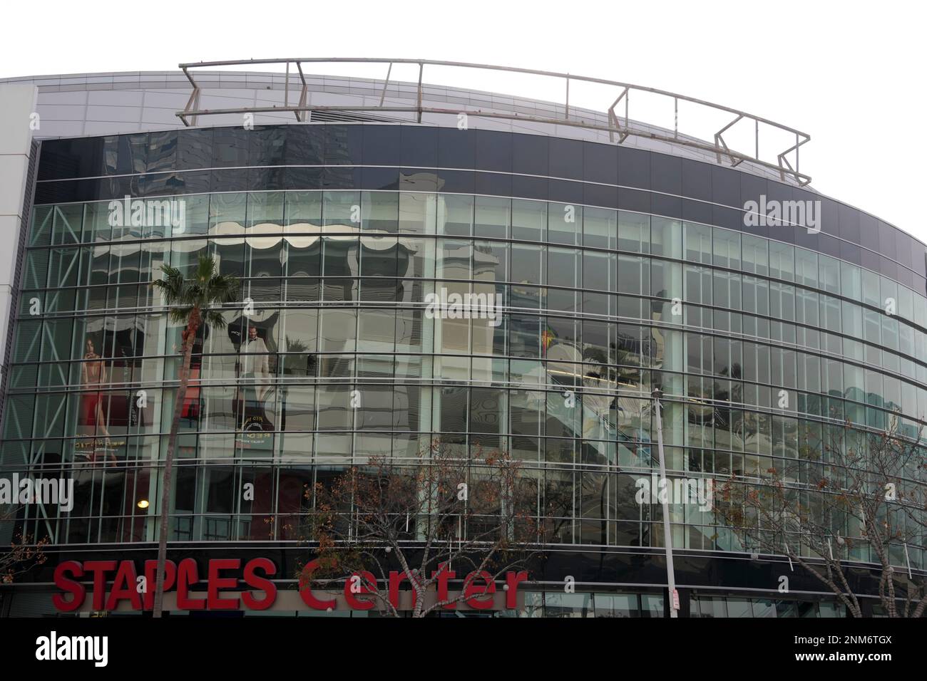 Signage at the Staples Center is removed in preparation for naming