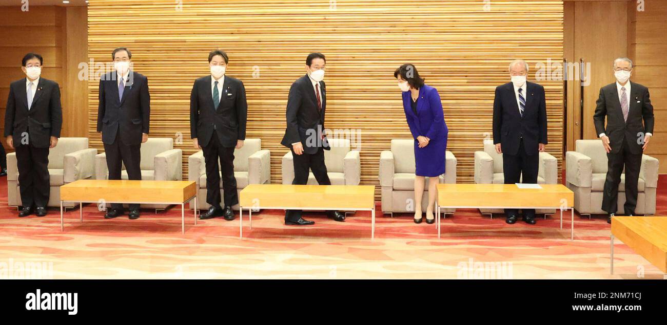 Japan's Prime Minister Fumio Kishida(C) attends a cabinet meeting at ...