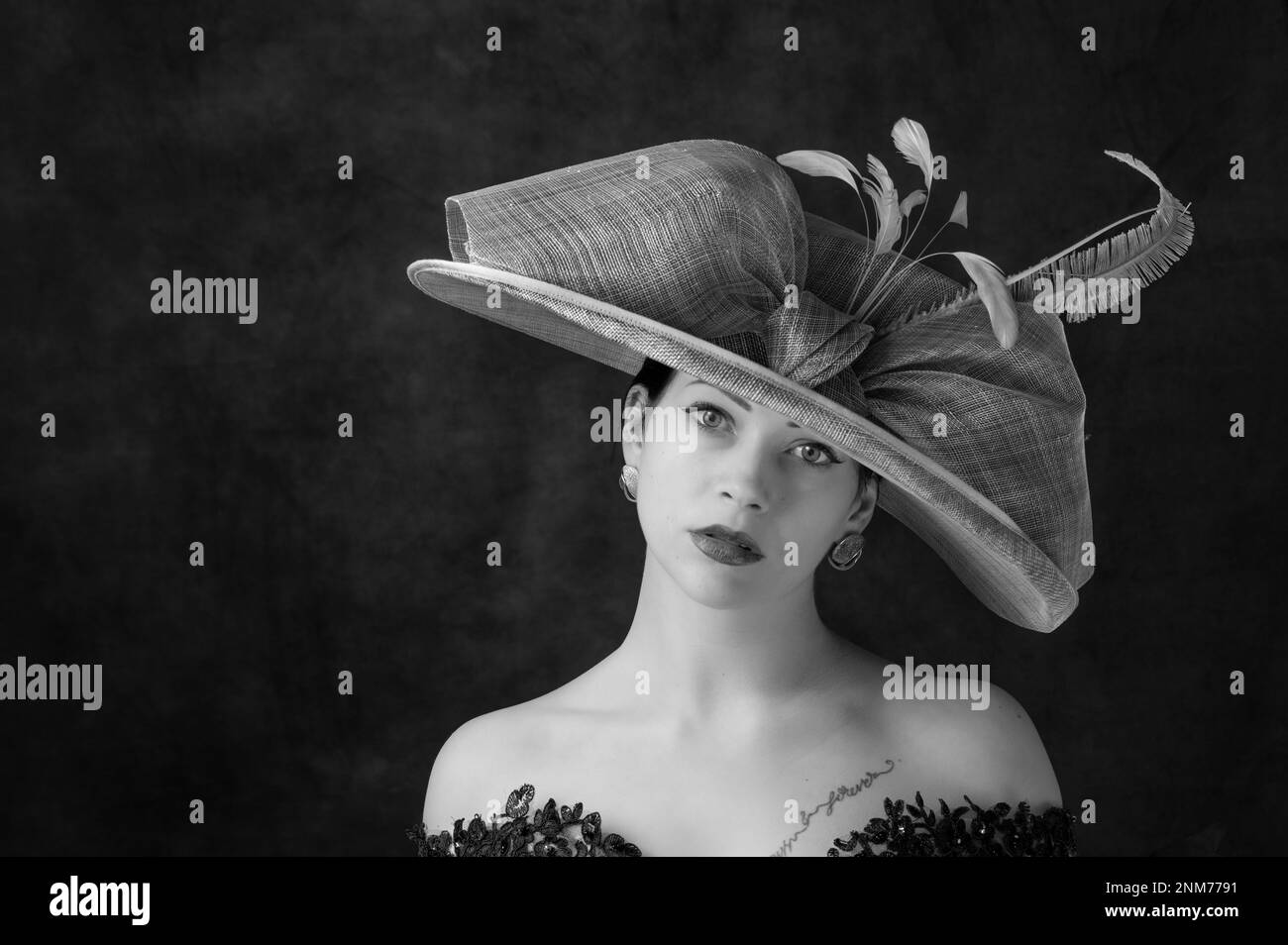 GIRL WITH HAT IN MONO IMAGE Stock Photo