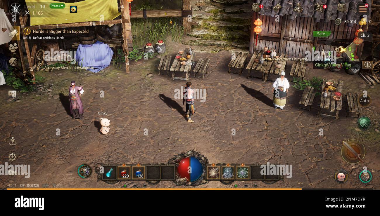 West Cork, Ireland, February 4, 2023. Gameplay in the Korean mobile mmorpg MIR M, screenshot from the phone. Asian video game with NFT tokens. Gamepla Stock Photo