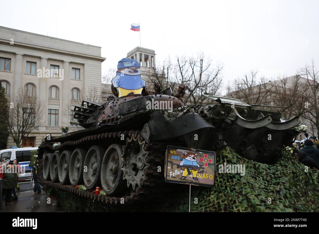 Germany, Berlin, 02/24/2023. A wrecked tank stands in front of the Russian embassy in Berlin-Mitte to commemorate the anniversary of the Russian attack on Ukraine. The destroyed T-72 tank is said to stand in front of the Unter Den Linden building for a few days as a memorial against the war. Stock Photo