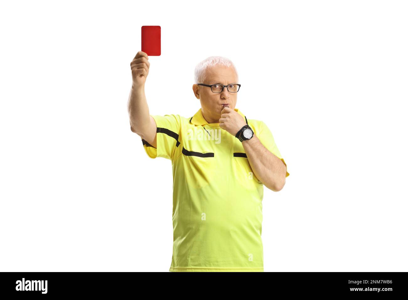 Football referee with a whistle showing a red card isolated on white background Stock Photo