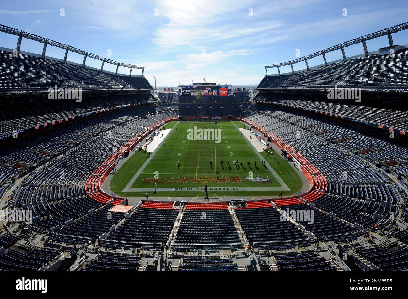DENVER, CO - NOVEMBER 28: An overview of the stadium as players warm up for  the NFL game between the Los Angeles Chargers and the Denver Broncos on  November 28, 2021, at