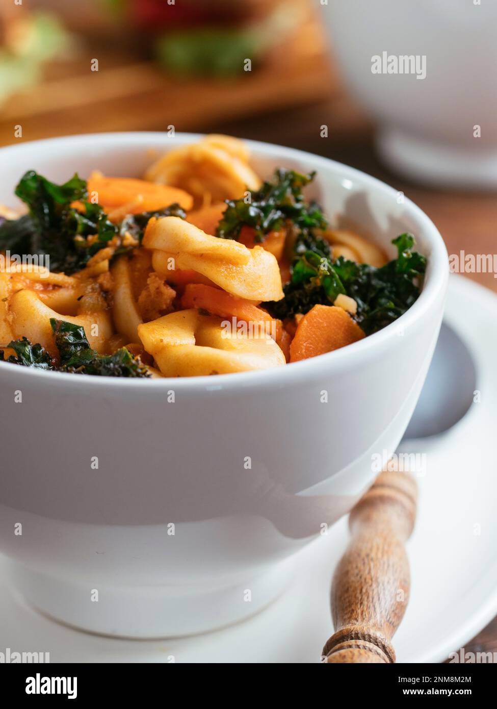 Vegan Tortellini Soup with TVP and Kale Stock Photo