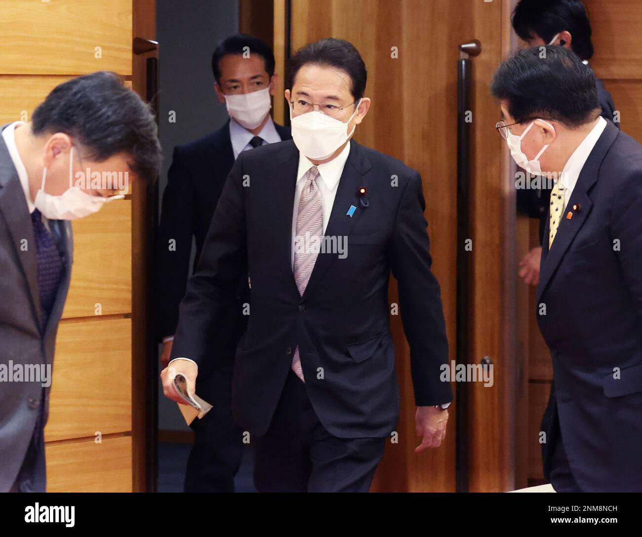 Japanese Prime Minister Fumio Kishida (C) attends a cabinet meeting at ...