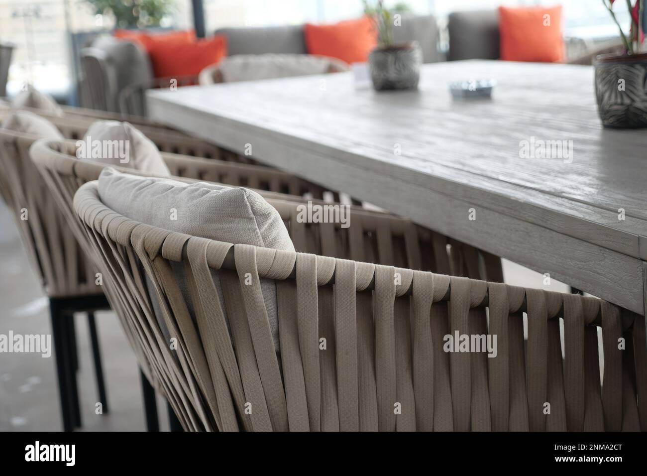 modern grey sofa with pillows in living room at home Stock Photo - Alamy