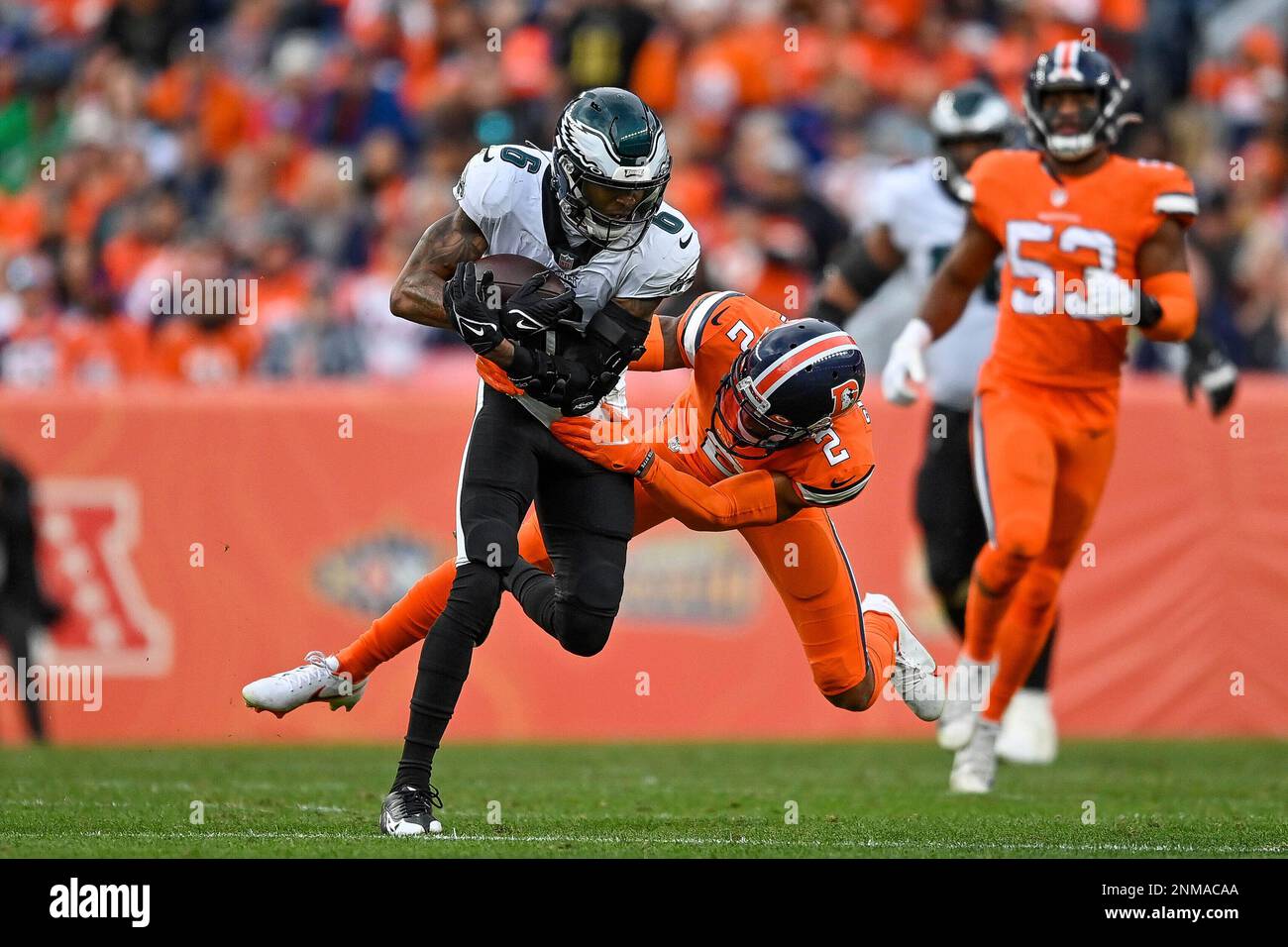 DENVER, CO - NOVEMBER 14: Philadelphia Eagles wide receiver DeVonta Smith  (6) is tackled by Denver Broncos cornerback Pat Surtain II (2) after a  catch during a game between the Denver Broncos