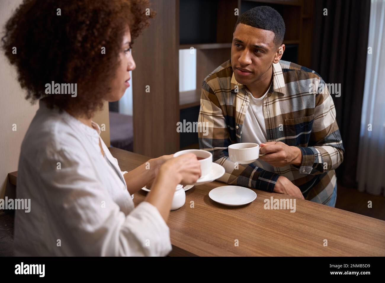 Chatting over a cup of tea hi-res stock photography and images - Alamy