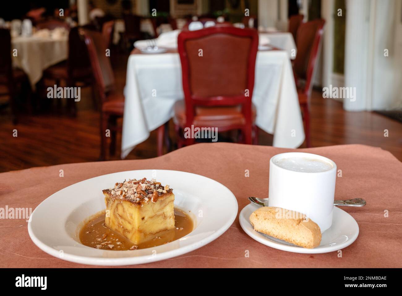 Muriels traditional Creole Cuisine Restaurant,  Famous Signature Pecan Bread Pudding Chartre Street French Quarter, New Orleans ,Louisiana United Stat Stock Photo